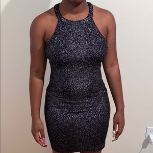 Black glitter party dress .